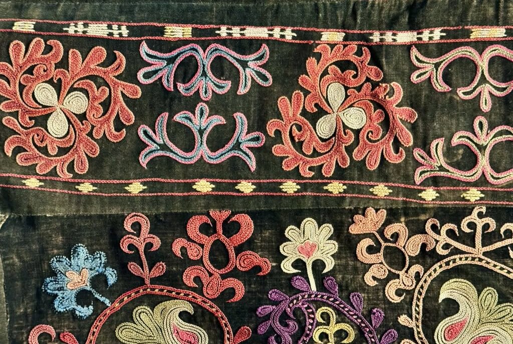 Embroidered felt piece for yurt decoration;shows typicla flowery motifs.