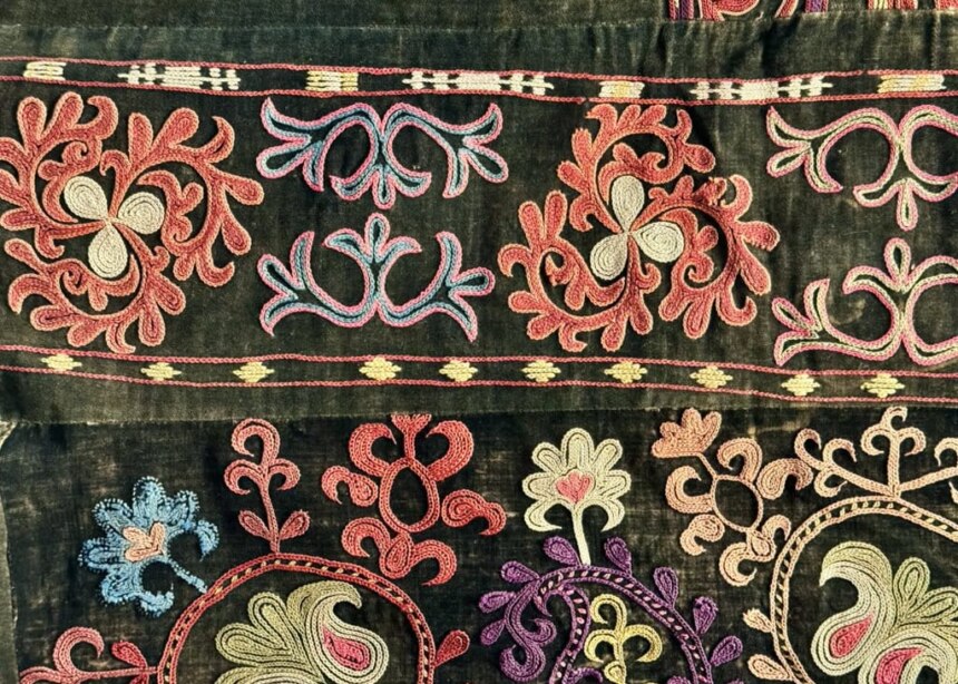 Embroidered felt piece for yurt decoration;shows typicla flowery motifs.