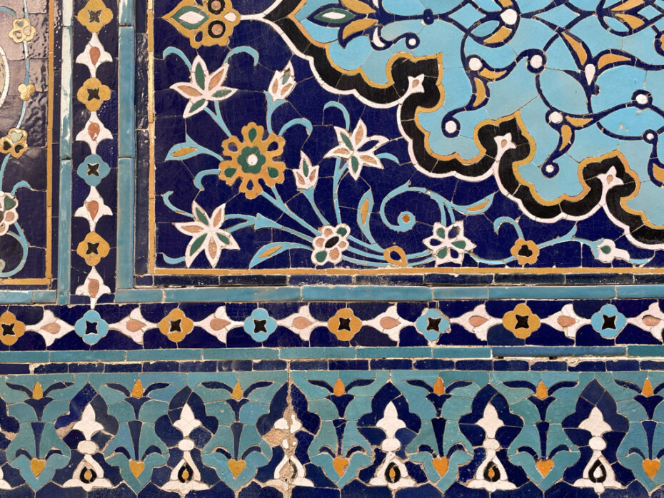 Blue and rust mosaic tile on mausoleum in Samarkand.