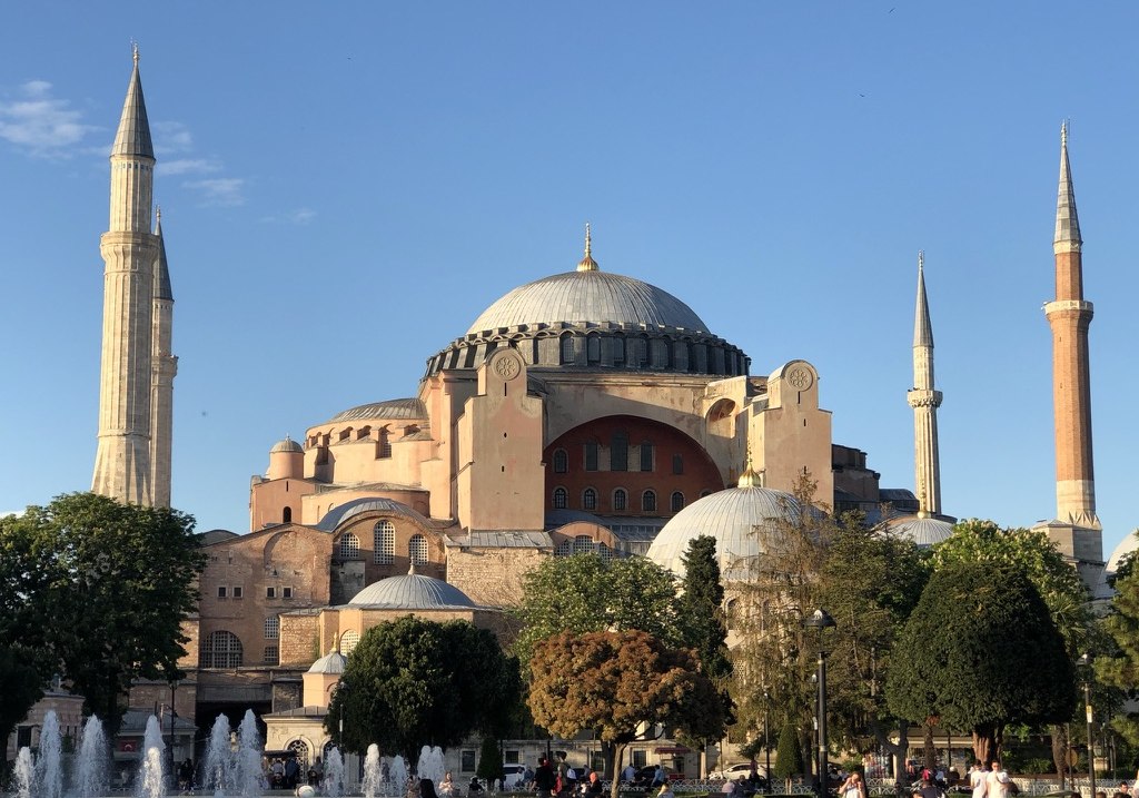 The enormous Hagia Sophia mosque with its four minarets, in Istanbul on a sunny day.