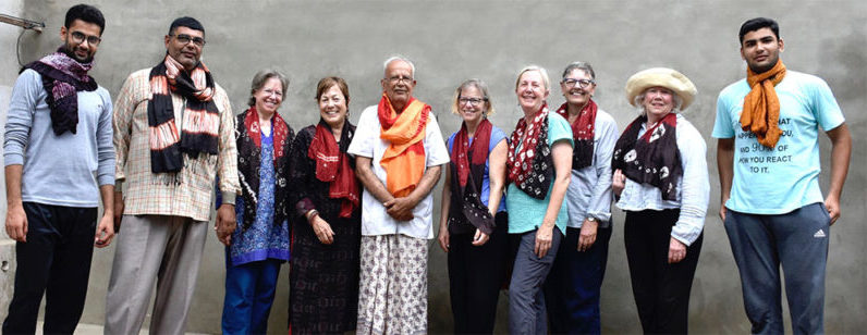 Previous travelers with silk scarves made in dye workshop with Master Ali M. Katri
