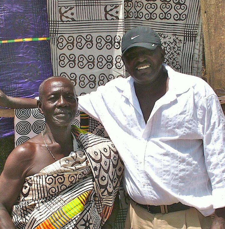 Ghanaian elder with traditional adinkra cloth wrapper.