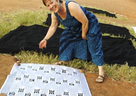 Spreading out adinkra to dry. GHANA