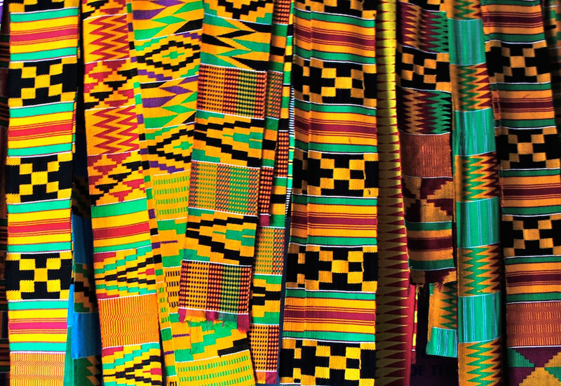 Colorful pieces of traditional kente arts of Ghana.