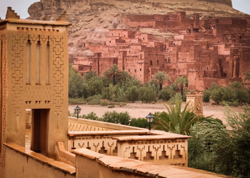 Red sandstone building in desert of Morocco