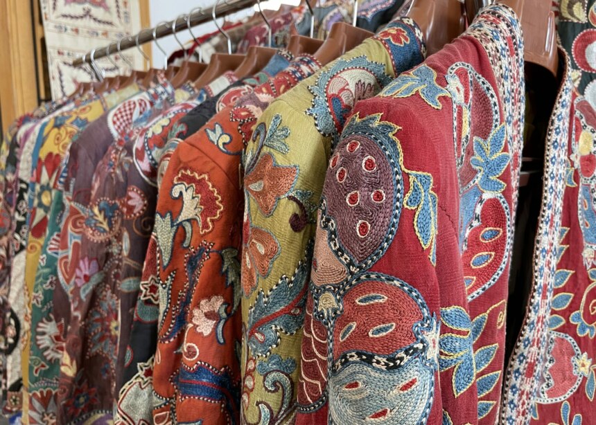 Hand-embroidered silk jackets in Samarkand market.
